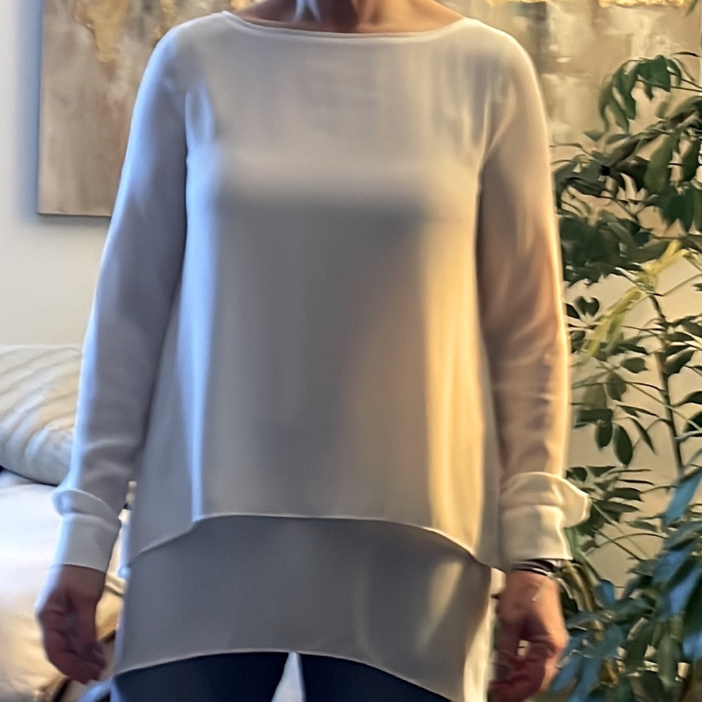 Cream colored, long, layered & flowy blouse